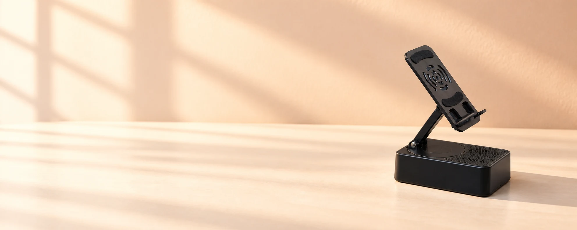 Folding phone stand with Bluetooth speaker